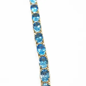 14kt Gold Bracelet with Blue Topaz 28cts
