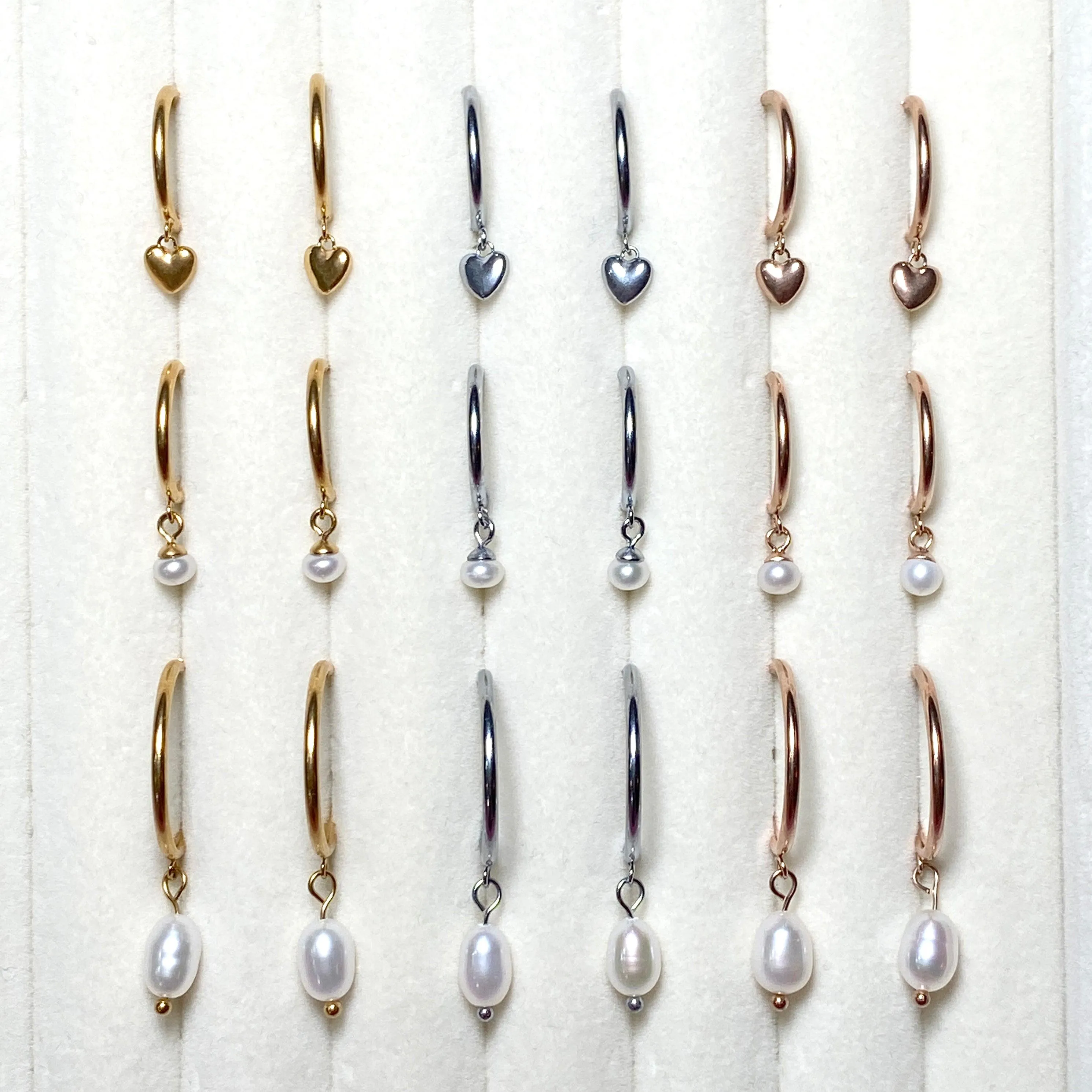 MINI HEART HUGGIE HOOP EARRINGS IN ROSE GOLD